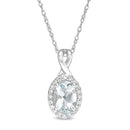 Oval Aquamarine and 1/15 CT. T.W. Diamond Frame Pendant in 10K White Gold